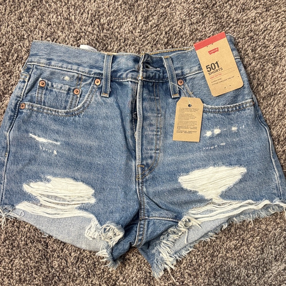 Levi's 501 Distressed Denim Shorts in Light Blue